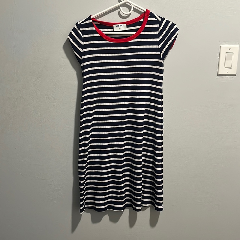 A navy blue and white stripped dress. Size 14 kids.